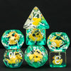 A set of resin dice shaped like adorable yellow animals for tabletop role-playing games