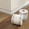 Roll of self-adhesive PVC wall trim featuring a subtle geometric pattern for baseboards and door frames