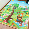 A colorful soft foam baby play mat featuring woodland animals and nature scenes for infants.