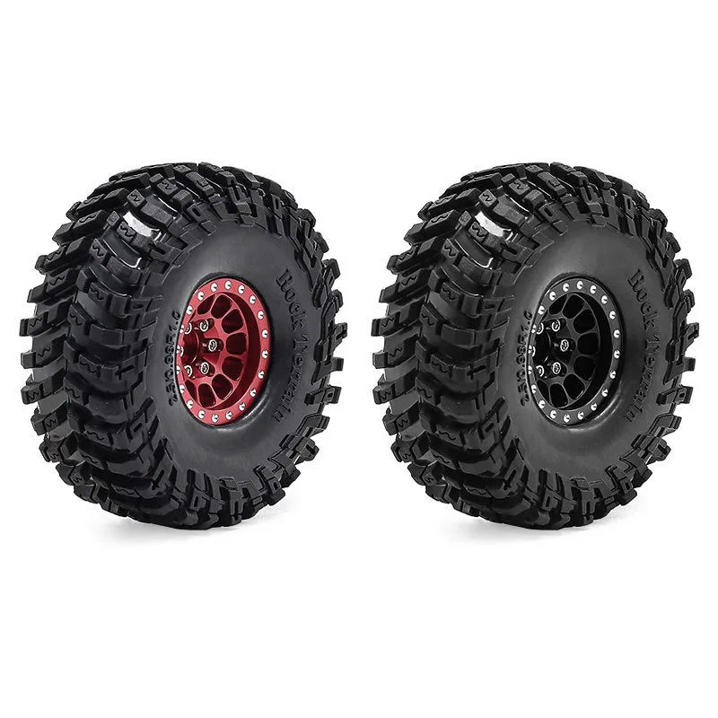 Set of four black metal beadlock RC crawler wheels with tires