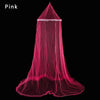 A sheer pink lace canopy mosquito net draped in a flowing, conical shape.