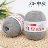 A ball of gray fine yarn labeled as Luxurious Cashmere Blend Fine Yarn for knitting and crochet