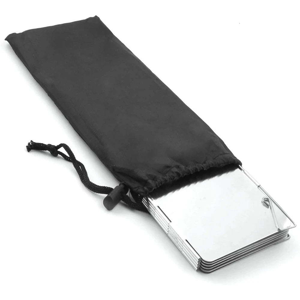 Black adjustable aluminum camping stove windscreen with a silver reflective panel.