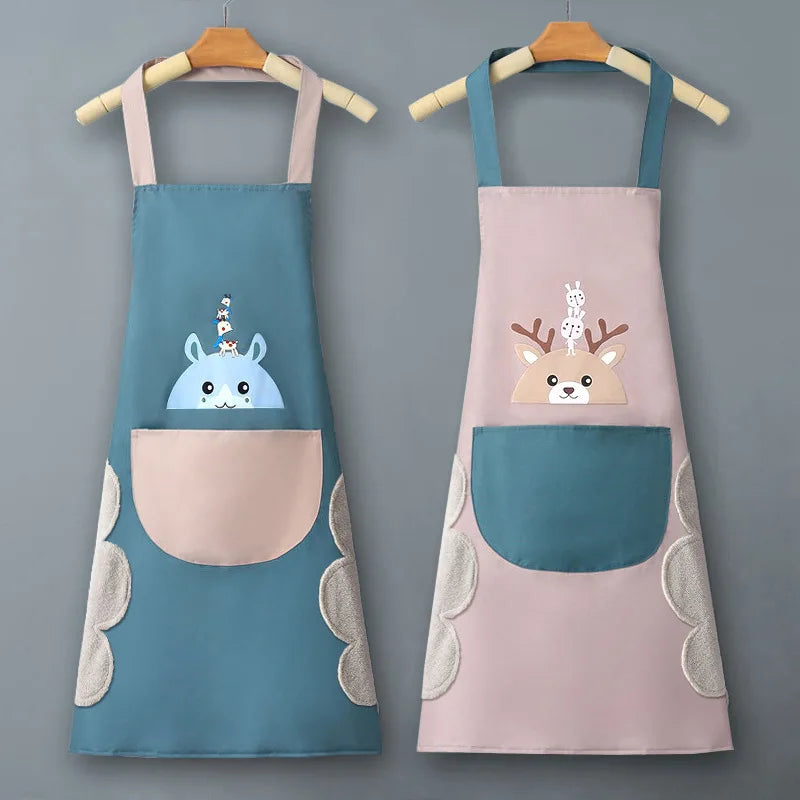 A light pink and blue waterproof kitchen apron hanging on a wooden hanger.
