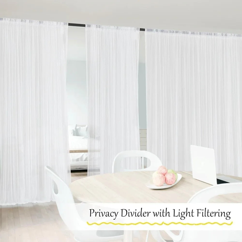 White privacy divider with light filtering fabric used in a room setting.