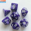 A set of seven purple and white polyhedral dice scattered on a white surface.