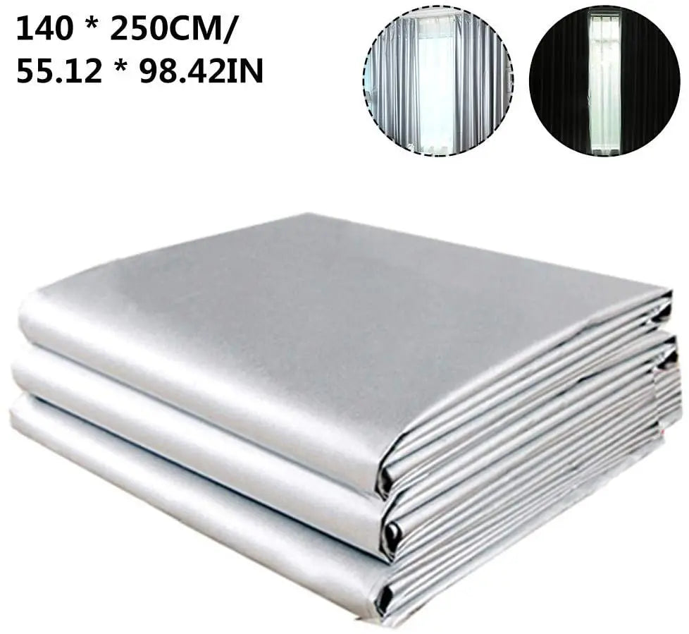 Stack of silver thermal blackout curtain panels with close-ups showing the fabric texture and finish.