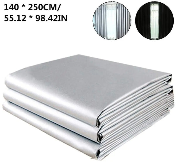 Stack of silver thermal blackout curtain panels with close-ups showing the fabric texture and finish.