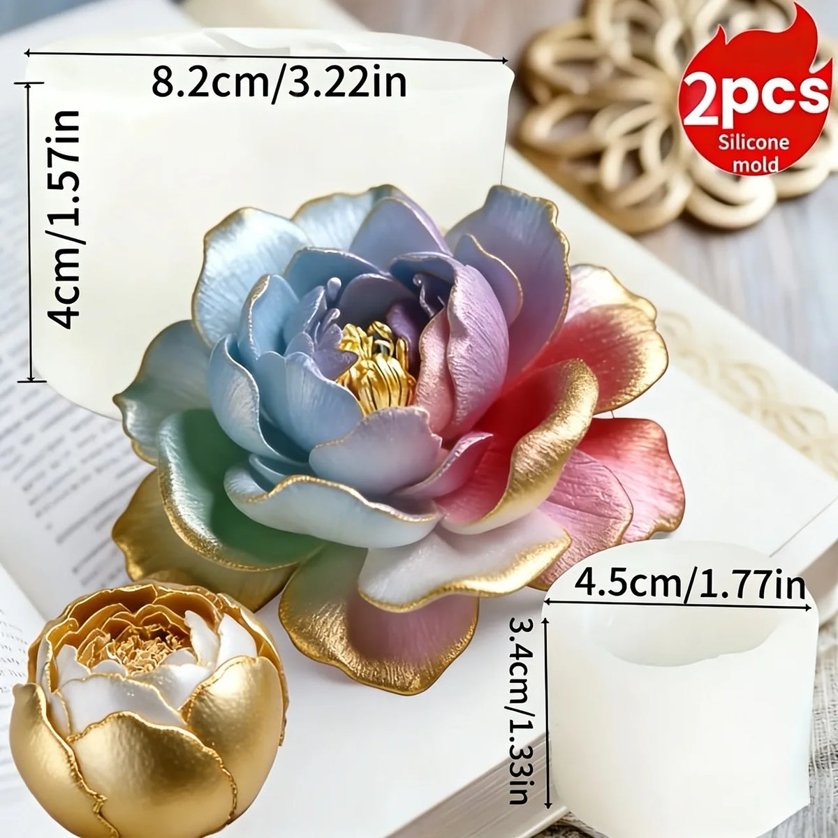 A pink and blue lotus flower silicone mold with gold accents shown next to a white mold.