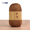 A ball of brown cotton blend crochet yarn with a label indicating 15 skeins.
