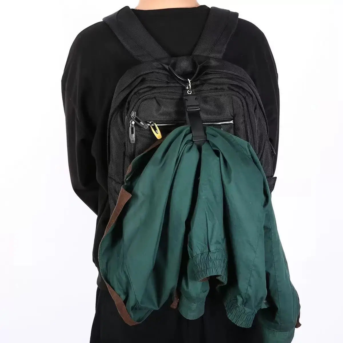Black adjustable travel luggage strap and belt with a dark green fabric bag.
