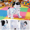 A white and black interactive robot dog toy is shown standing on a colorful mat, with close-ups of its features.