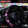Black steering wheel cover with pink floral designs for a car, showing the inner ring-free grip.