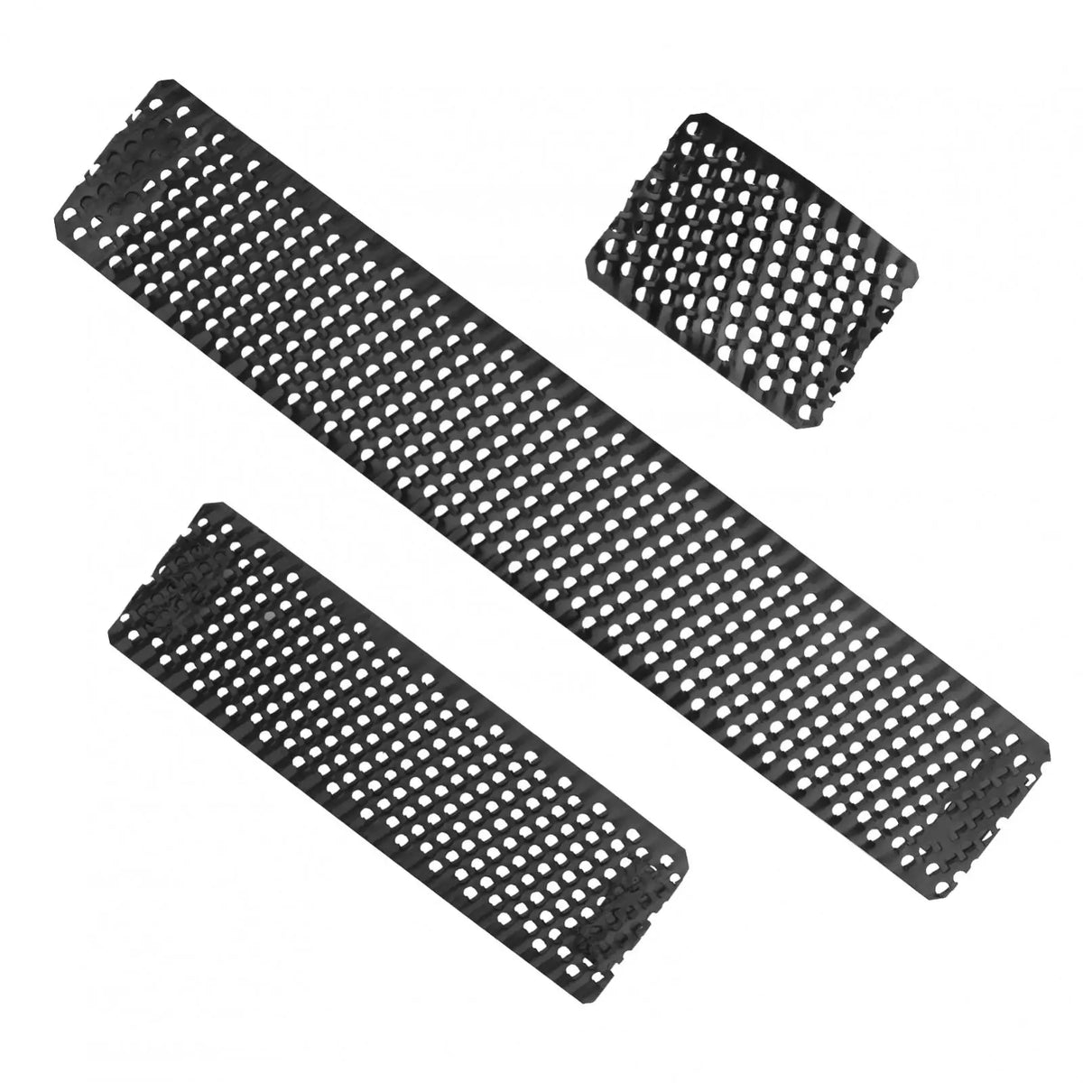 Several flat Surform shaver blades for smoothing and shaping, arranged in various orientations.