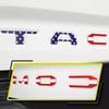 Three 3D letter emblems T, AC, and C for a Toyota Tacoma tailgate.