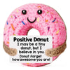 A pink donut shaped plush ornament with a smiling face and text encouraging positivity.
