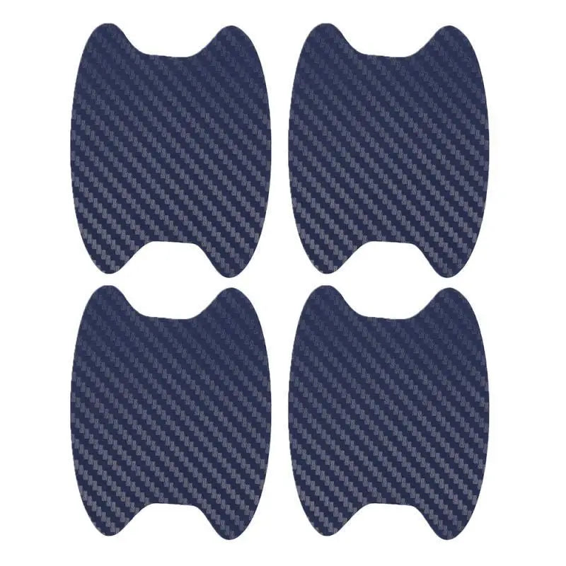 A set of four dark blue carbon fiber car door handle protective covers.