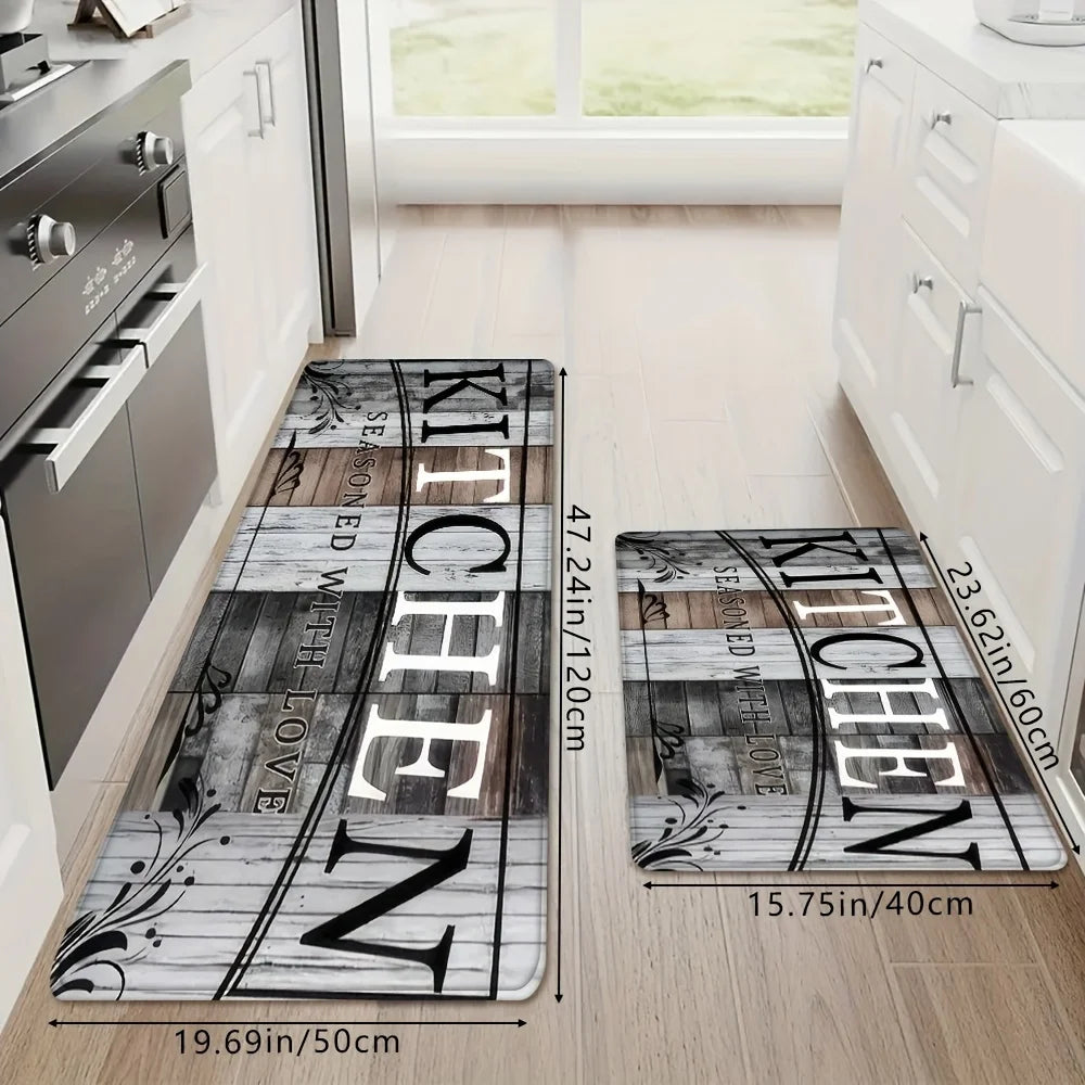 A rectangular kitchen mat featuring a distressed wood grain pattern in gray and white tones.