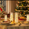 A festive holiday table setting with a plate of food and candles in the foreground, set against a blurred Christmas tree back