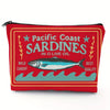 Pochette de maquillage rouge avec un design vintage de sardines à l'huile d'olive.