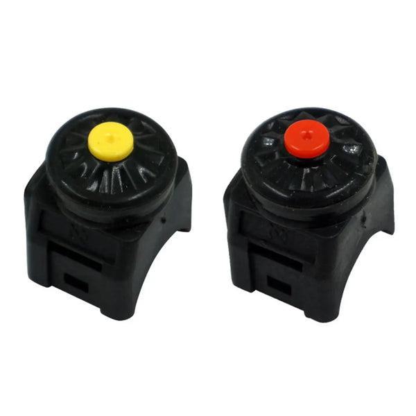 Black handlebar kill switch with a yellow and red push button for motorcycles