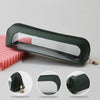 A dark green leather travel makeup organizer pouch with a clear window and gold hardware.