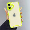 A hand holds a clear phone case with neon green accents and a glow-in-the-dark finish for an iPhone.
