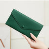 A dark green slim wallet made of PU leather with card slots shown in various angles.