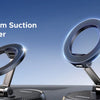 A silver magnetic vacuum suction phone holder mounted on a dashboard surface.
