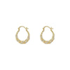 Pair of gold finish twisted zircon hoop earrings