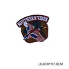 A dark brown embroidered patch with the text Southern Vibes and a depiction of a bird in flight.