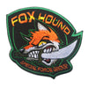 An embroidered patch featuring a stylized fox hound head with a hook and loop backing, surrounded by the text FOX HOUND and S