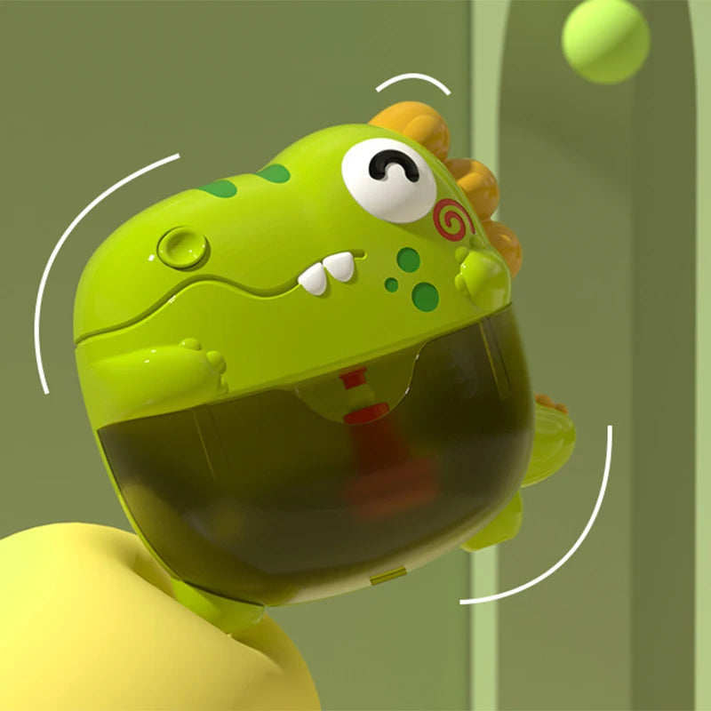A bright green dinosaur-shaped bubble machine is being held by a yellow hand, with bubbles floating nearby.