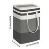 A gray and white striped laundry hamper with handles shown in a side view.