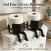Modern black toilet paper holder with a human shape design for bathroom storage.