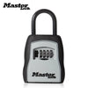 A black portable combination key safe with a silver handle and keypad, branded Master Lock.
