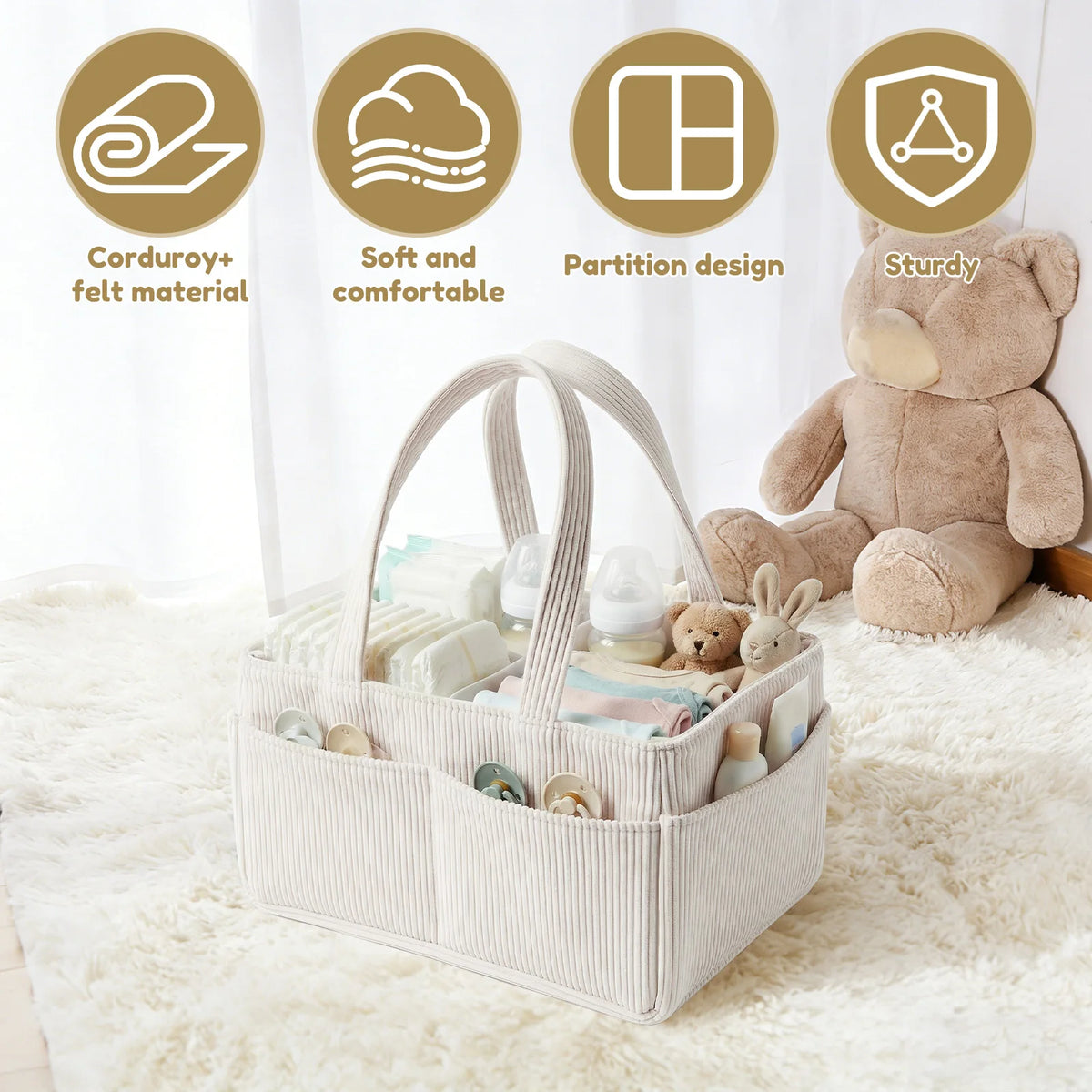 A beige corduroy baby diaper caddy organizer with handles is shown on a white fluffy rug next to a teddy bear.