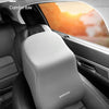 Gray memory foam car headrest and lumbar support pillow installed in a car seat.