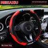 Red and black carbon fiber steering wheel cover for a car, showing an interior view.