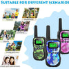 A pair of pink and green walkie-talkies are shown with various outdoor activity scenarios like playground and climbing.