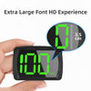A hand holds a black smart GPS speedometer with a large green LED display showing 100 Km/h.