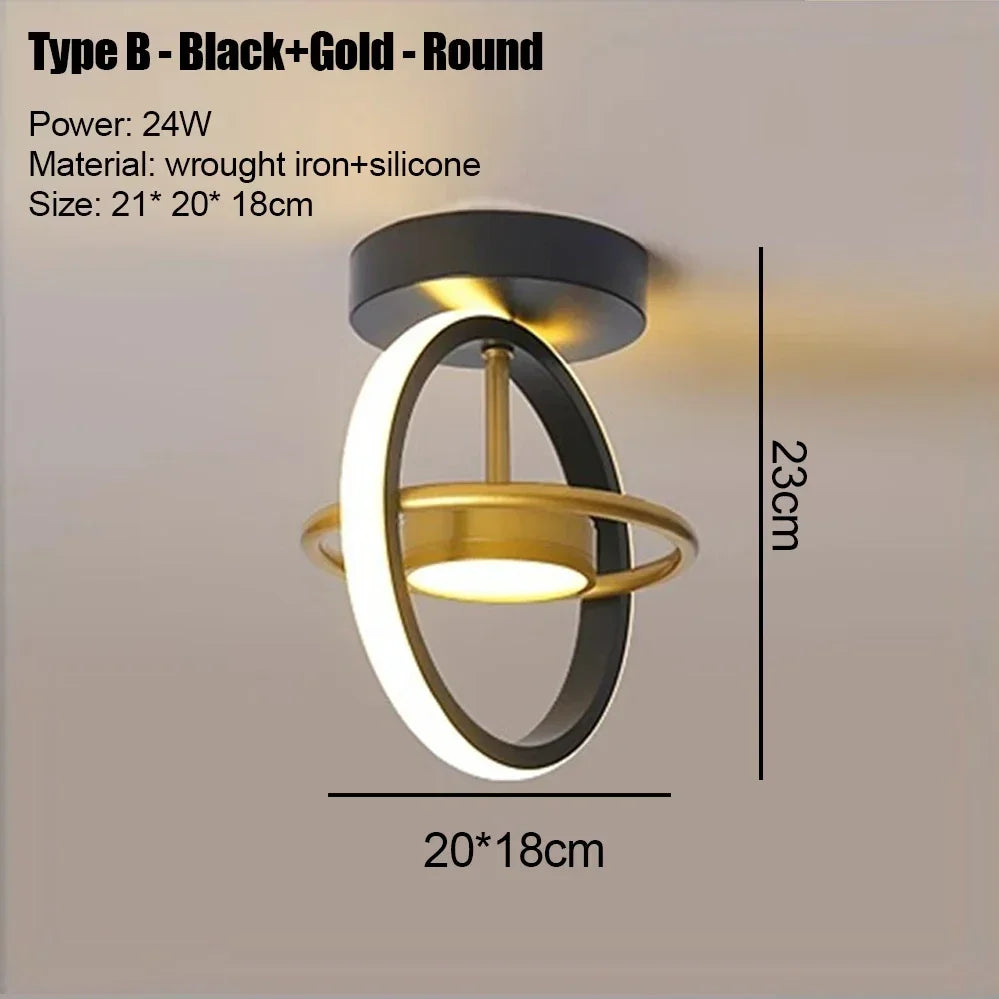 A round black and gold LED ceiling light fixture with a circular design mounted on a wall.