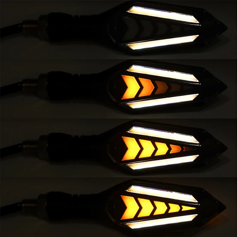 A close-up view of a universal 12V motorcycle LED flowing turn signal indicator light.