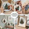 Handcrafted ornaments made from Christmas embroidery kits featuring festive evergreen trees and bears