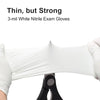 A pair of white nitrile exam gloves is being stretched out by a pair of white gloves.