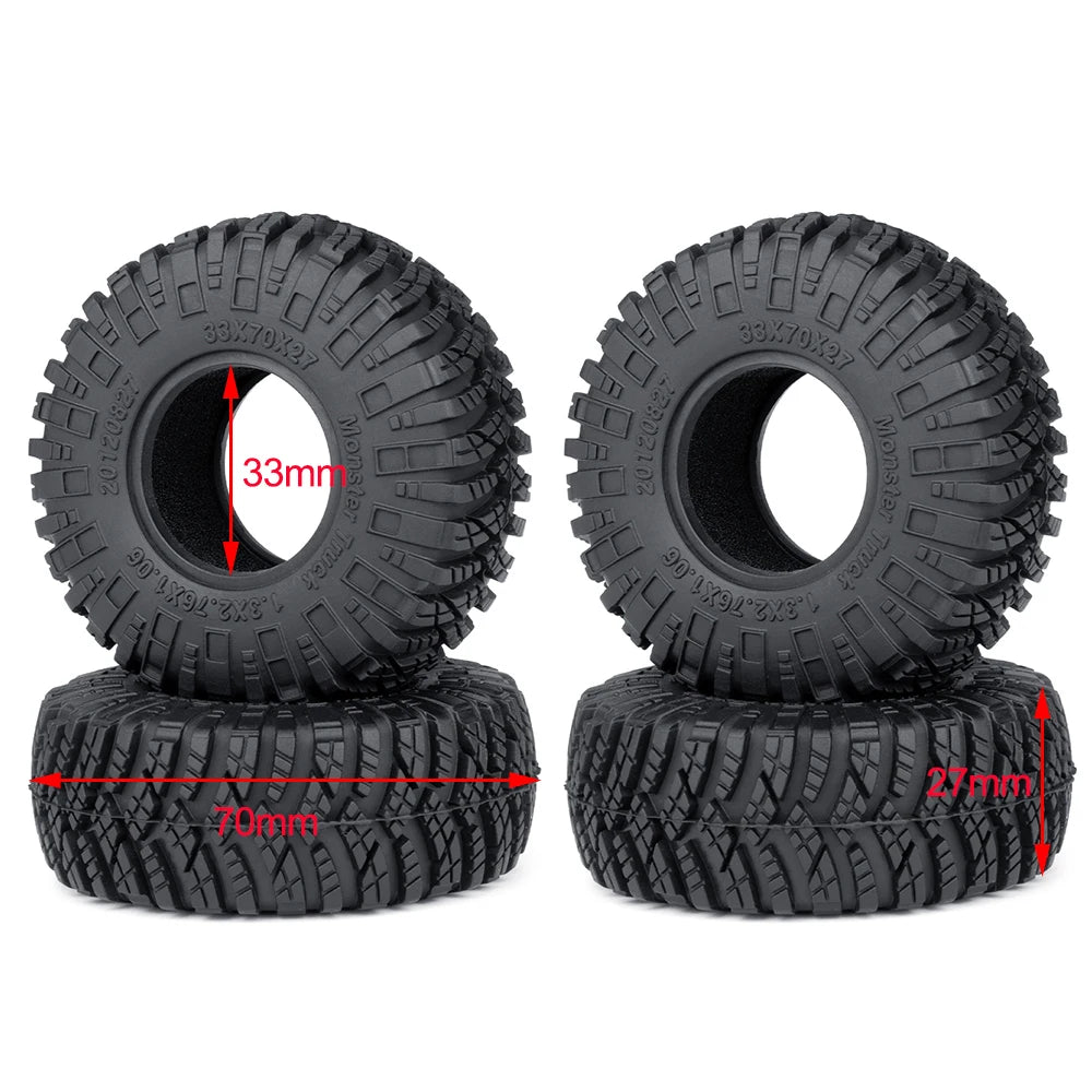 A set of black mud terrain wheels and tires for RC crawlers, showing the tire and wheel components.