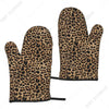 A pair of brown and black leopard print oven gloves.