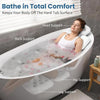 A person relaxing in a white bathtub with various supports for the head, back, hip, and legs.