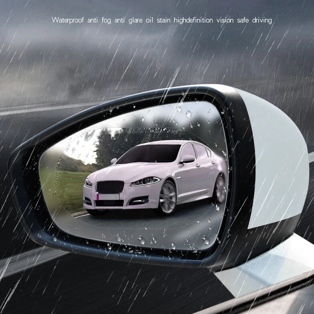 A car mirror showing a vehicle, with water droplets visible on the surface.