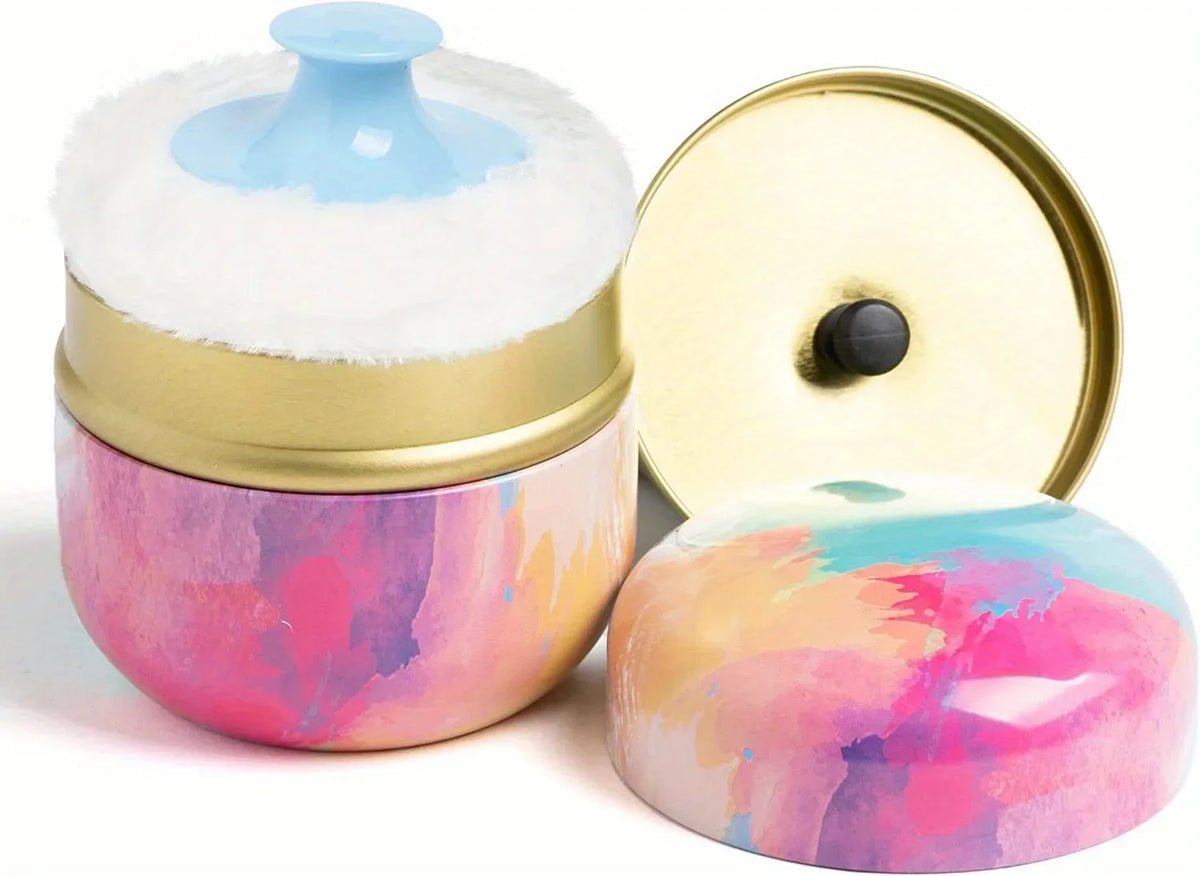 A refillable loose powder container with a light blue lid and a pink watercolor-style base.